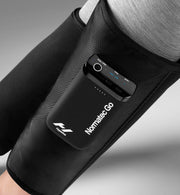 Black Normatec Go compression device on a person's calves.